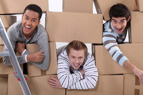 Boxes and furniture being loaded during a Kensington house move