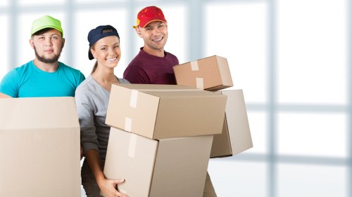 Packing and loading furniture into a moving van in Kensington