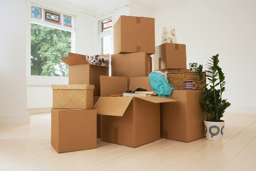 Packed boxes and furniture ready for a Kensington move