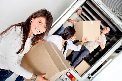 A moving van and crew supporting a Kensington property relocation