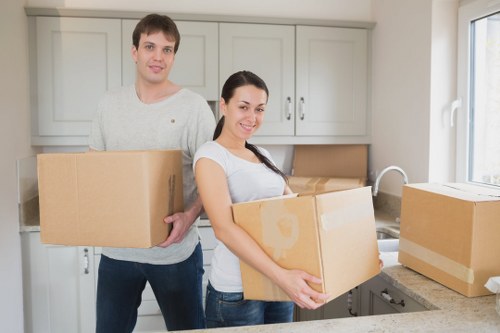 Packed boxes and furniture ready for removal van transport in Kensington